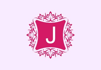 Pink vintage frame with J initial letter in the middle