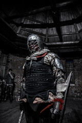 A knight in armor in a castle