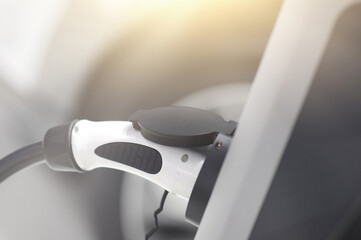New energy Is electric power for cars Charging a new battery Future car transportation.