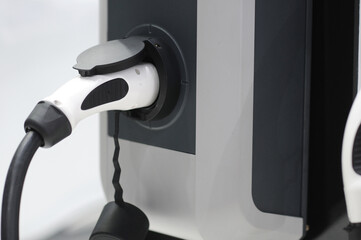 New energy Is electric power for cars Charging a new battery Future car transportation.