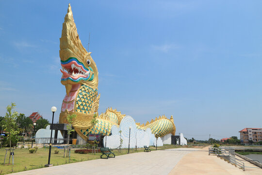 YASOTHON, THAILAND Statue of Phaya Kan Kark (The Toad king) in Yasothon, Thailand. Landmark building constructed in shape of naga (serpent)