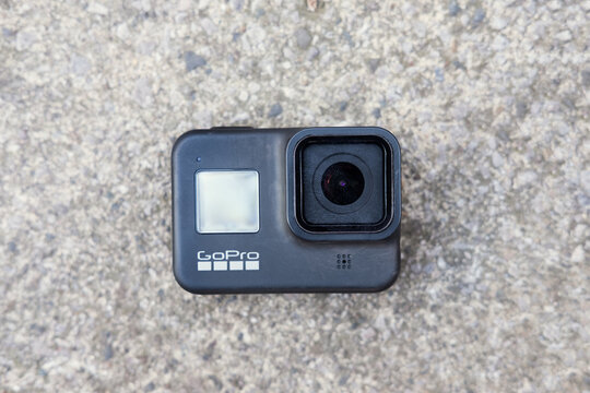 london uk, 23.04.2021 A go pro hero 8, 4k action sport digital video recorder on a cold hard concrete and cement floor. Action sport rugged action cameras.