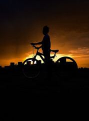 Obraz premium silhouette of a cyclist