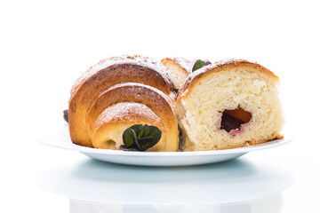 baked sweet homemade buns with plum inside