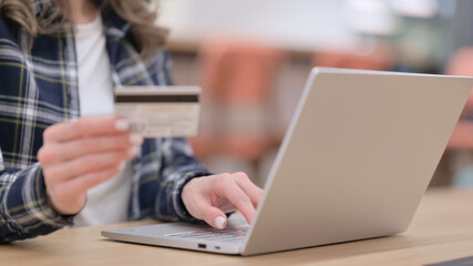 Female Hands doing Online Shopping on Laptop, Close up