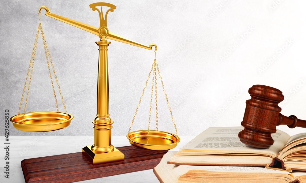 Wall mural Justice Scales and books and wooden gavel on the table.