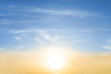 Fototapeta na wymiar sparkle sun on evening blue cloudy sky, natural sunset background