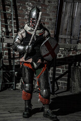 A knight in armor in a castle