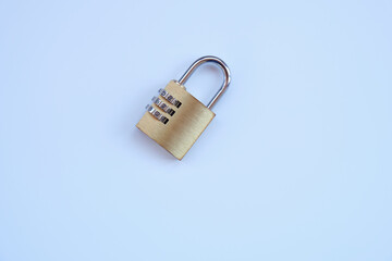 Close up, top view golden padlock with password,pass code on white background.