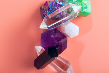 Beautiful crystals of amethyst, rock crystal, rose quartz, fluorite of various shapes and colors. Natural semi-precious stones on a pink background - 429626839