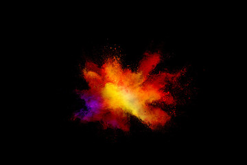 Red and Yellow powder explosion on black background.