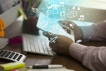 Modern digital tablet in businessman hands