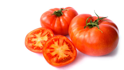Ripe tomatoes on a white background