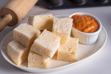 Steamed buns with Thai tea custard in white plate