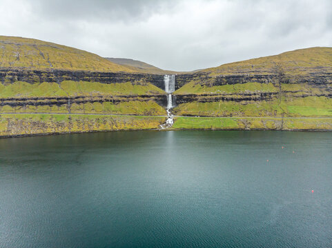 Aerial view of the Fossa Waterfall on Faroe Islands, the highest waterfall in the country, Streymoy province, Faroe Islands.