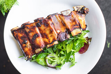 fried ribs meat pork beef or lamb marinated sauce hot spices trend meal snack copy space food background rustic. top view
