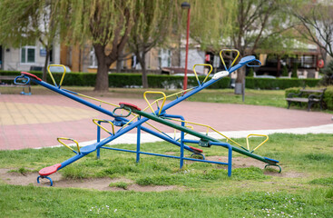 Obraz na płótnie Canvas Empty children's playground. Rocking chairs.