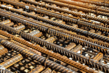 Industrial background. Preparation for pouring concrete. Construction of buildings of reinforced concrete.steel reinforcement bar texture in construction site,Closeup of Steel rebars
