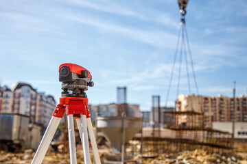 Surveyor equipment GPS system or theodolite outdoors at highway construction site.Measuring instrument close-up. Surveyor engineering with total station