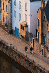 The quay along the Sambre and onlookers at the end of the day.