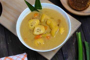 Kolak pisang is Indonesian traditional dessert made of banan and sweet potato with palm sugar sauce