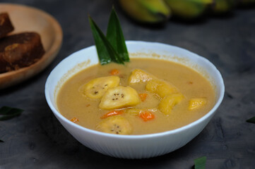 Kolak pisang is Indonesian traditional dessert made of banan and sweet potato with palm sugar sauce