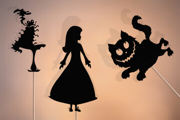 Alice in Wonderland storytelling, fairytale shadow puppets.