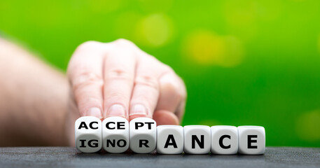 Hand turns dice and changes the word 