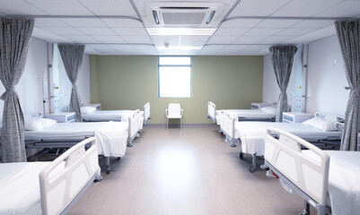 Fototapeta na wymiar General view of an empty hospital room with two rows of beds