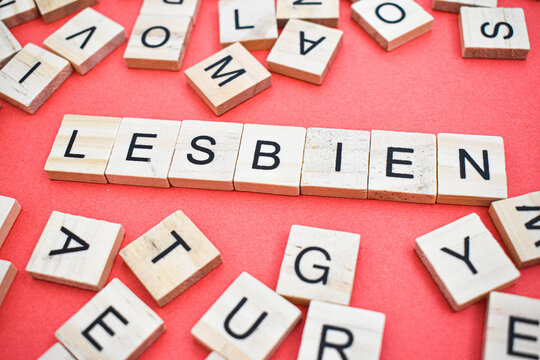 Lesbien word on wooden cube blocks on with letters all around. Concept