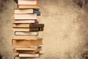 Collection stack of old retro books on background