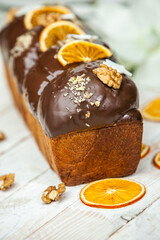 Panettone is the traditional Italian dessert for easter in 2021. Homemade panettone covered in chocolate and sprinkles. Bread served as dessert.