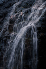 Fototapeta na wymiar Amazing long exposure of a waterfall in Quebec, Canada