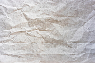White crumpled paper background, the texture is old for a web design screensaver. Template for various purposes