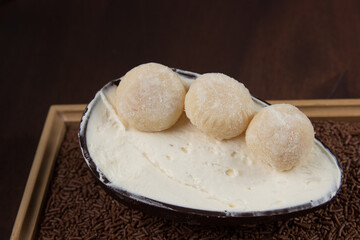Chocolate Easter Egg filled with powdered milk brigadeiro (brigadier), Goumert egg chocolate tradition in Brazil.