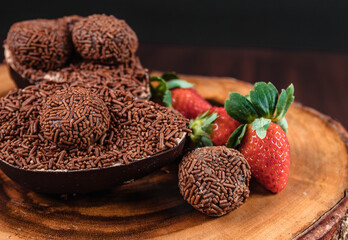 Chocolate Easter Egg filled with brigadeiro (brigadier) and strawberries, Goumert egg chocolate tradition in Brazil.