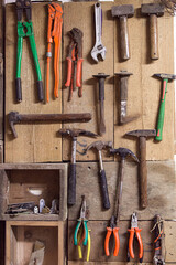 Tools panel on the wall in workshop.
