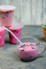 Es campur or ice mixed dessert is one of the typical Indonesian drinks that is made by mixing various types of ingredients like fruits and jelly in sweet syrup. Selective focus, Blurry