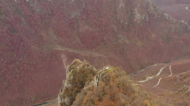 Flyover a mountain peak near small town Tutin, Raska District of southwestern Serbia