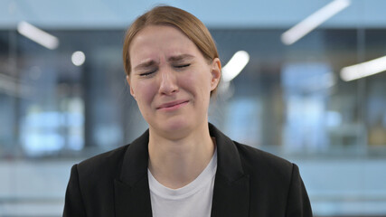 Upset Businesswoman Crying after Failure 