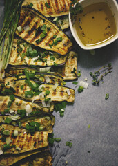 Flat lay and negative space of grilled eggplant with olive oil and basil homemade cooking