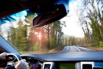 Driving on mountain curve road.