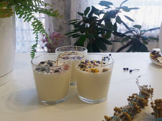 Handmade flower soy candles with herbs and crystals