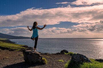 Woman Practicing Yoga on the Maui Coast