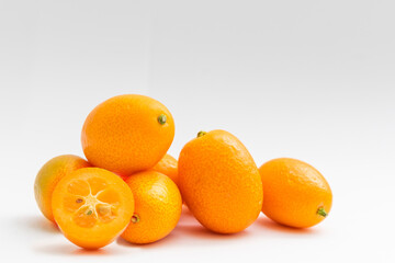 kumquat on white background. exotic fruits