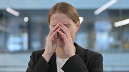 Young Businesswoman Crying and Feeling Upset