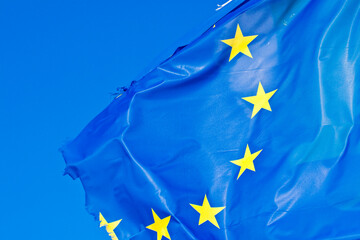 Frayed European flag - concept image with copy space