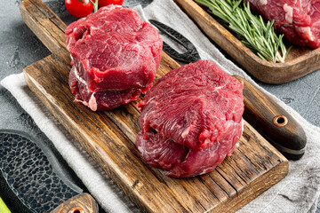 Raw fresh marbled meat black angus steak, Filet mignon tenderloin cut, on wooden cutting board, on...