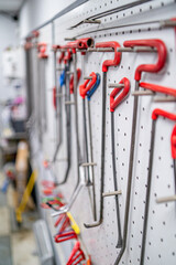 Fototapeta premium Paintless Dent Repair. Tools for car repair without painting in the workshop isolated static. Hammer, clips, machine, work, master, professionalism. High quality 4k footage