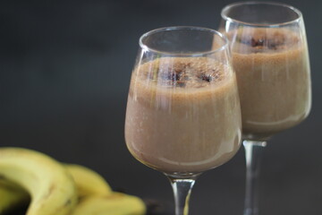 Chocolate banana milkshake made with frozen bananas, cocoa and chilled milk